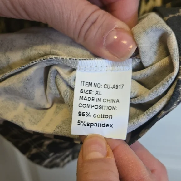 Elegant Leopard Print Blouse with Black Floral Detail - Picture 9 of 10